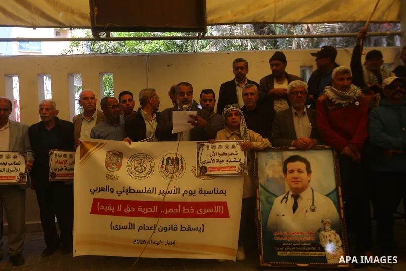 Families of Palestinian prisoners participate in a protest in front of the International Committee of the Red Cross (ICRC) headquarters in Gaza City, demanding the release of their relatives from Israeli prisons and expr...