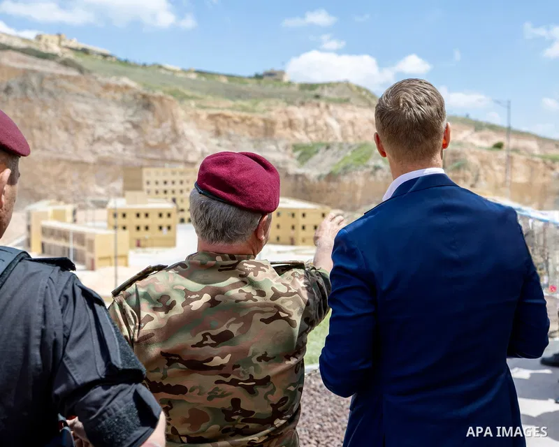 King Abdullah II of Jordan and Finnish President Alexander Stubb observe a military exercise at the King Abdullah II Special Operations Training Center (KASOTC), where they receive a briefing on the center's role in trai...