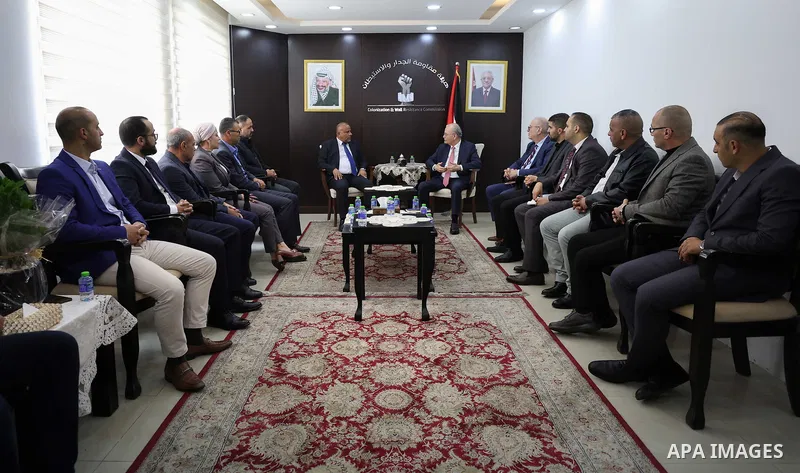 Palestinian Prime Minister Mohammed Mustafa meets with Moayad Shaaban, head of the Wall and Settlement Resistance Commission, at the commission’s headquarters in Ramallah, in the West Bank, on May 4, 2026. Mustafa affirm...