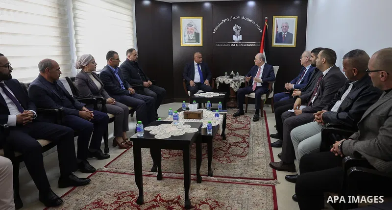 Palestinian Prime Minister Mohammed Mustafa meets with Moayad Shaaban, head of the Wall and Settlement Resistance Commission, at the commission’s headquarters in Ramallah, in the West Bank, on May 4, 2026. Mustafa affirm...