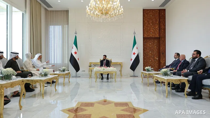 Syrian President Ahmed al-Sharaa receives an Emirati delegation headed by Thani al-Zeyoudi, in the presence of officials from both countries, including Noura al-Kaabi and Omar al-Darai, at the People's Palace in Damascus...