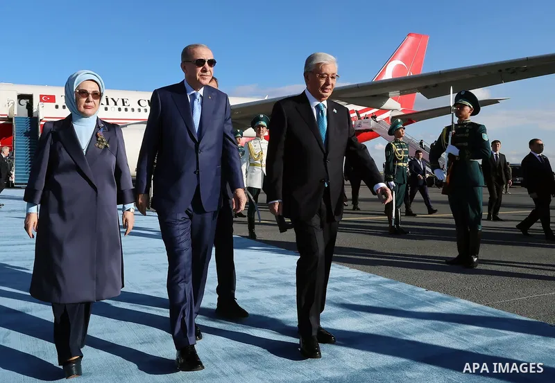 Turkish President Recep Tayyip Erdoğan shakes hands with Kazakh President Kassym-Jomart Tokayev upon his arrival at Nursultan Nazarbayev International Airport in Astana, Kazakhstan, on May 13, 2026, during an official vi...