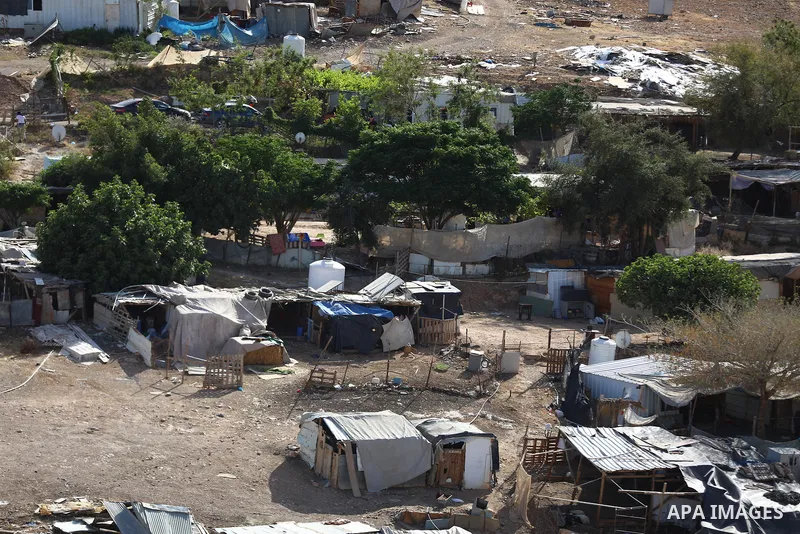 General views show the Palestinian Bedouin village of Khan al-Ahmar, located along Highway 1 east of Jerusalem, on May 19, 2026. Around 350 Palestinians live in the village, which recently faced an Israeli evacuation ord...
