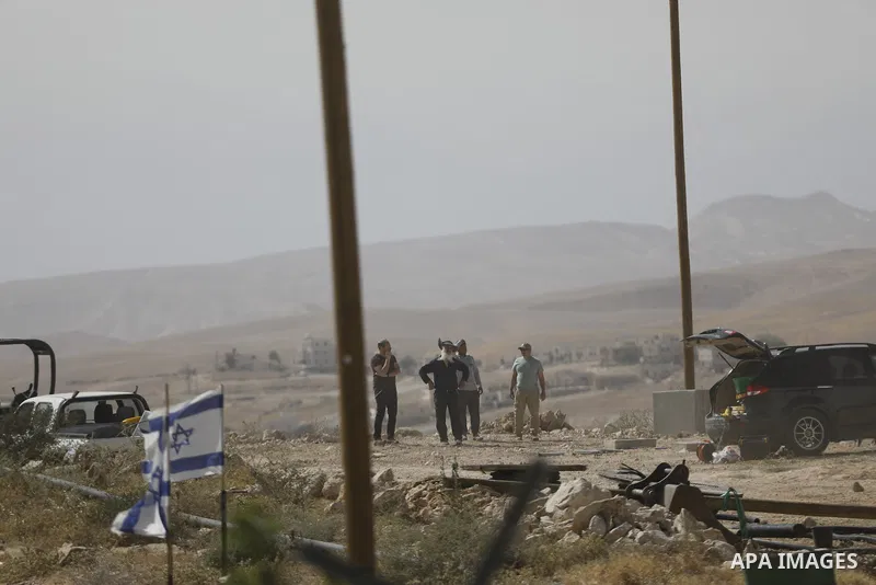 Israeli settlers continue expanding a recently established settlement outpost in the village of Umm al-Kheir in the Masafer Yatta area, south of Hebron in the occupied West Bank, on May 20, 2026. Settlers, under the prot...