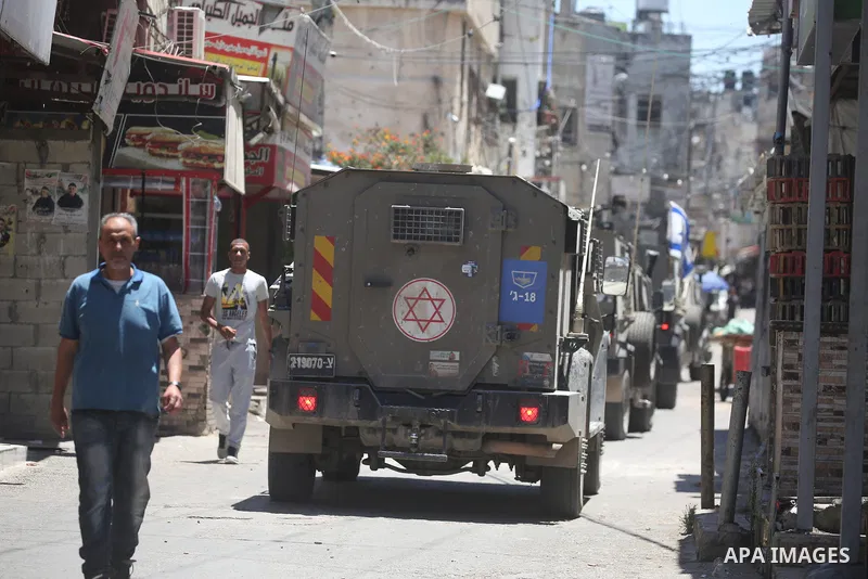 Israeli forces carry out a raid in the Balata refugee camp east of Nablus in the occupied West Bank, on June 7, 2026. Soldiers and military vehicles were deployed throughout the camp during the operation. Photo by Mohamm...