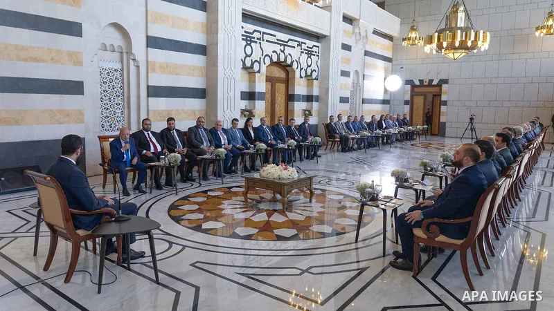 Syrian President Ahmad al-Sharaa meets a delegation representing the Damascus Chamber of Industry, the Damascus Chamber of Commerce, and the Rural Damascus Chamber of Commerce at the People's Palace in Damascus, Syria, o...