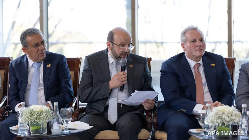 Syrian President Ahmad al-Sharaa meets a delegation representing the Damascus Chamber of Industry, the Damascus Chamber of Commerce, and the Rural Damascus Chamber of Commerce at the People's Palace in Damascus, Syria, o...