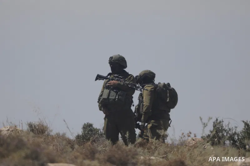 Palestinians take part in a protest against plans to confiscate land for settlement expansion in Khirbet Humsa, west of Hebron in the occupied West Bank, on June 9, 2026. Local sources said Israeli forces dispersed the d...
