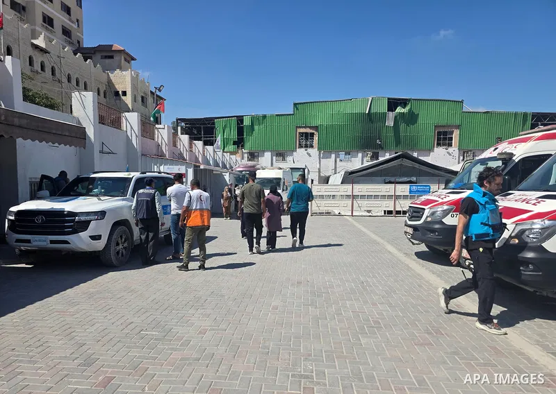 Palestinian patients and wounded people, accompanied by their relatives, leave the Palestinian Red Crescent Society headquarters in Khan Younis, southern Gaza Strip, on June 17, 2026, en route to the Rafah crossing for m...