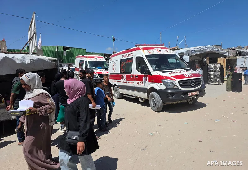Palestinian patients and wounded people, accompanied by their relatives, leave the Palestinian Red Crescent Society headquarters in Khan Younis, southern Gaza Strip, on June 17, 2026, en route to the Rafah crossing for m...