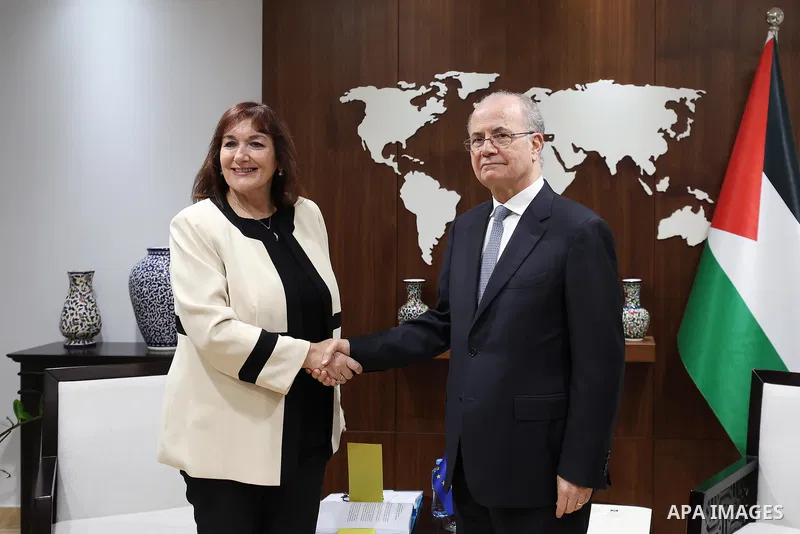 Palestinian Prime Minister Mohammad Mustafa meets with European Commissioner for the Mediterranean Dubravka Šuica, in the presence of European Union representatives, during a meeting and briefing session at his office in...