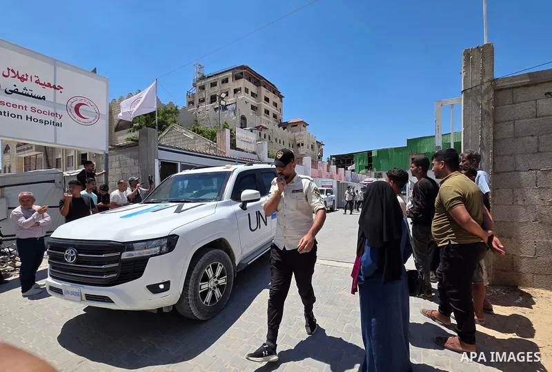 Palestinian patients and wounded people, accompanied by their relatives, leave the Palestinian Red Crescent Society headquarters in Khan Younis, southern Gaza Strip, on June 25, 2026, as they head to the Rafah crossing f...