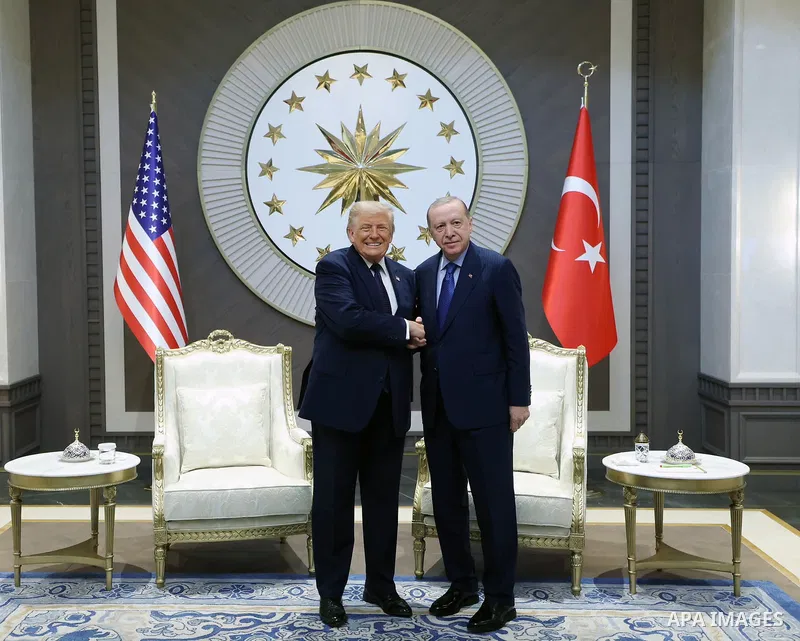 Turkish President Recep Tayyip Erdogan welcomes U.S. President Donald Trump upon his arrival at Ankara Airport in the Turkish capital on July 7, 2026. Trump is visiting Turkey to participate in the 36th NATO Heads of Sta...
