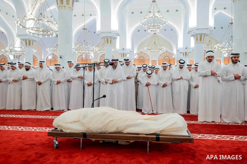 Qatar's Emir Sheikh Tamim bin Hamad Al Thani performs the funeral prayer for former Emir Sheikh Hamad bin Khalifa Al Thani at Imam Muhammad ibn Abd al-Wahhab Mosque in Doha, Qatar, on July 12, 2026. Photo by Emiri Diwan...