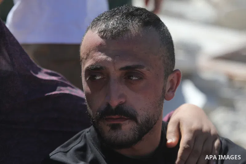 Palestinians sit on the rubble of a home demolished by Israeli forces in the town of Beit Awa, south of Hebron, in the occupied West Bank, on July 20, 2026. The house belonged to Ahmad Masalma, whose family inspected the...