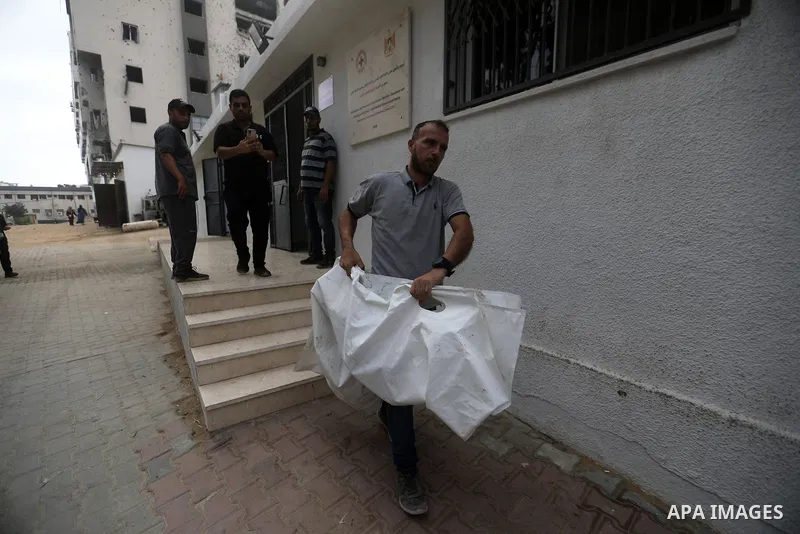 Mourners bid farewell to the bodies of Firas al-Masri, his wife, and their four children after they were killed in an Israeli airstrike that targeted a house belonging to the al-Masri family on al-Thalathini Street in Ga...