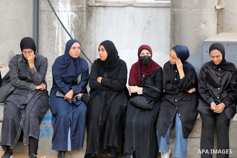 Mourners bid farewell to the bodies of Firas al-Masri, his wife, and their four children after they were killed in an Israeli airstrike that targeted a house belonging to the al-Masri family on al-Thalathini Street in Ga...
