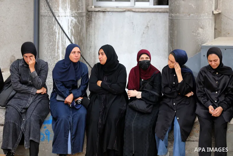 Mourners bid farewell to the bodies of Firas al-Masri, his wife, and their four children after they were killed in an Israeli airstrike that targeted a house belonging to the al-Masri family on al-Thalathini Street in Ga...