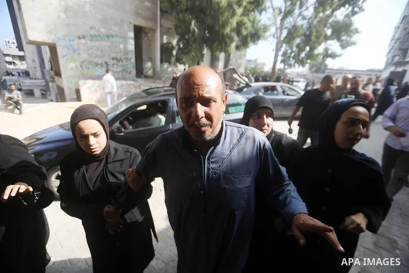 Mourners bid farewell to the bodies of Firas al-Masri, his wife, and their four children after they were killed in an Israeli airstrike that targeted a house belonging to the al-Masri family on al-Thalathini Street in Ga...