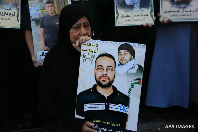 Palestinians take part in a solidarity rally in support of Palestinian prisoners held in Israeli prisons in the West Bank city of Nablus, on July 21, 2026. Participants called for the release of the prisoners as relative...