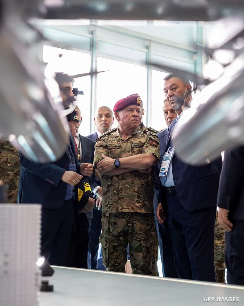 Jordan's King Abdullah II tours one of the exhibition halls during the Farnborough International Airshow 2026 in Farnborough, Britain, on July 22, 2026, where he viewed the latest innovations in the aviation, defense, sp...