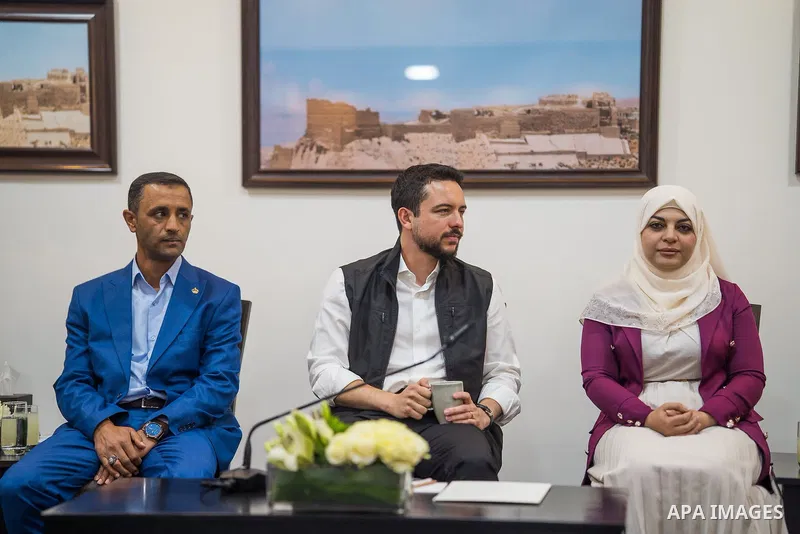 Jordan's Crown Prince Al Hussein bin Abdullah II meets young men and women from Karak Governorate, Jordan, on July 22, 2026, during an event highlighting the importance of strengthening young people's capabilities and em...
