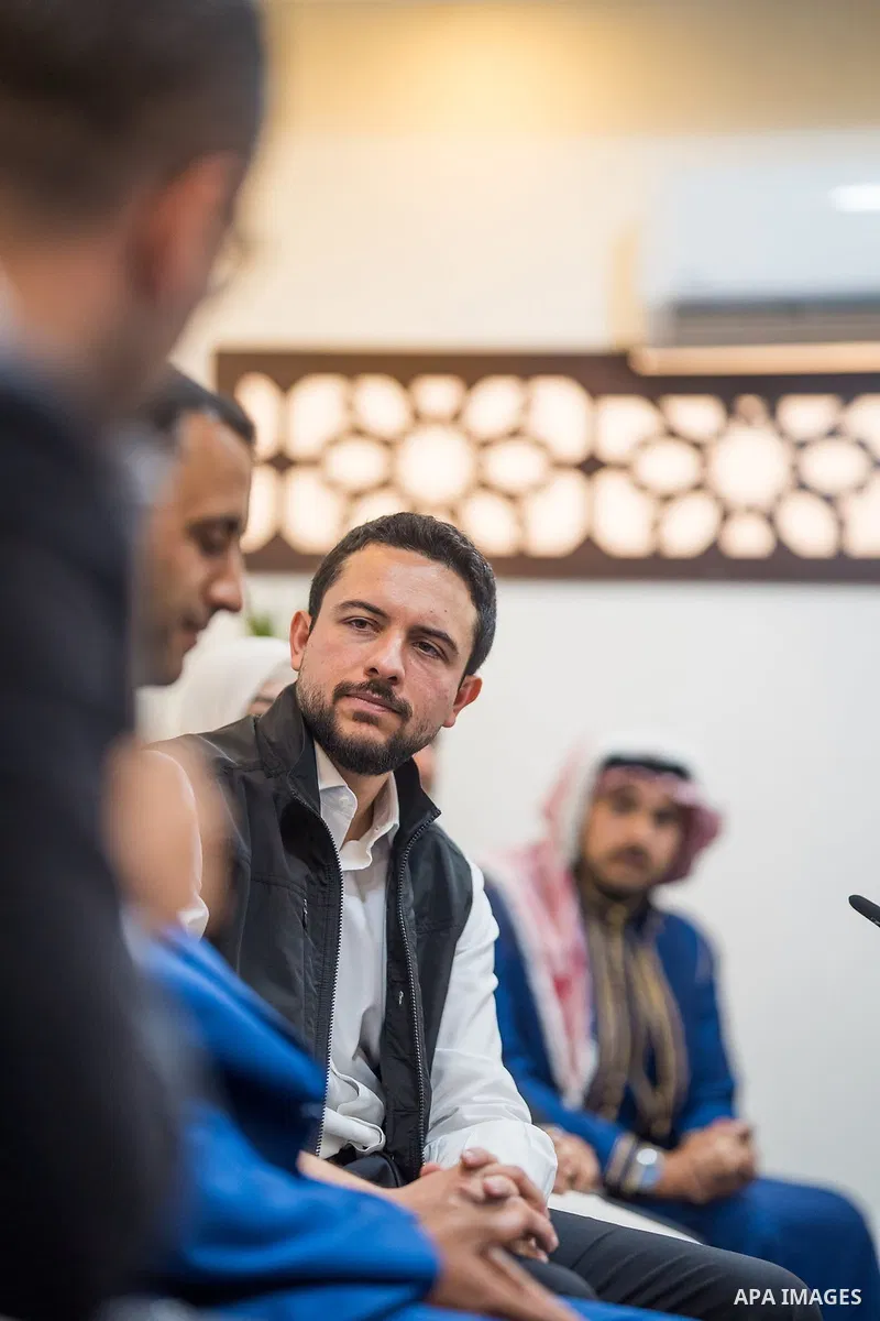 Jordan's Crown Prince Al Hussein bin Abdullah II meets young men and women from Karak Governorate, Jordan, on July 22, 2026, during an event highlighting the importance of strengthening young people's capabilities and em...