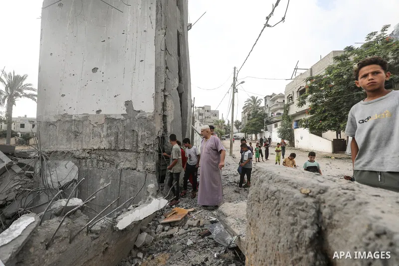 Palestinians inspect damage at Al-Noor Mosque following an attack in al-Bureij refugee camp, central Gaza Strip, on July 24, 2026. The damage comes despite an ongoing ceasefire, as places of worship and civilian faciliti...