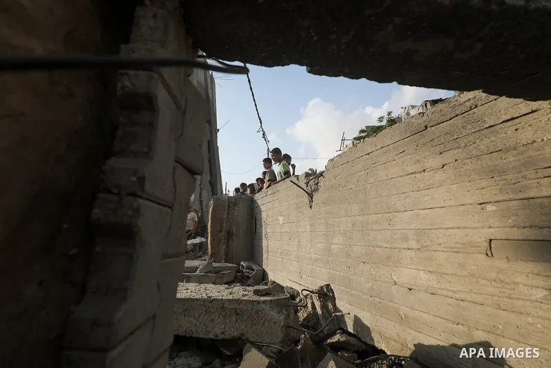 Palestinians inspect damage at Al-Noor Mosque following an attack in al-Bureij refugee camp, central Gaza Strip, on July 24, 2026. The damage comes despite an ongoing ceasefire, as places of worship and civilian faciliti...