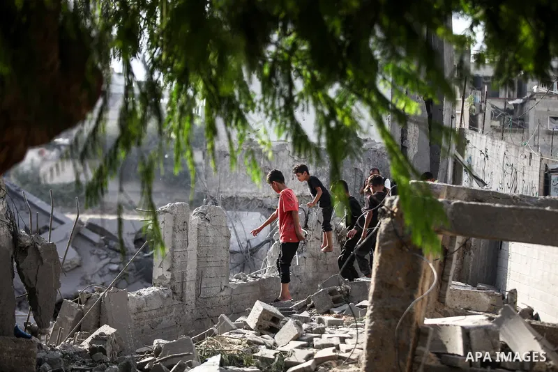 Palestinians inspect damage at Al-Noor Mosque following an attack in al-Bureij refugee camp, central Gaza Strip, on July 24, 2026. The damage comes despite an ongoing ceasefire, as places of worship and civilian faciliti...