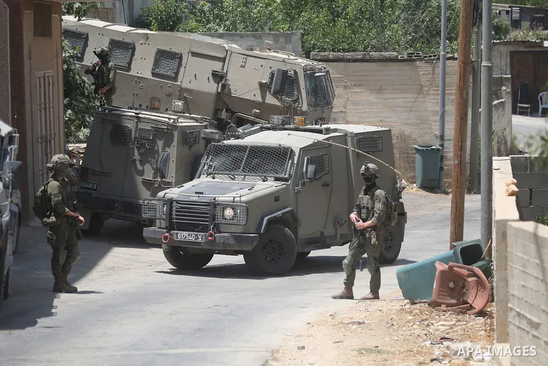 Israeli troops deploy during a military operation in the village of Tell, near the West Bank city of Nablus, on Saturday, July 25, 2026. Photo by Mohammed Nasser\ apaimages