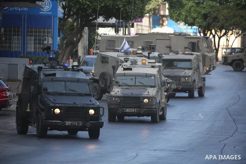 The Israeli military said a violent confrontation broke out between Israelis and Palestinians in the occupied West Bank on July 25, a day after clashes elsewhere in the territory left six people dead. Violence in the Isr...