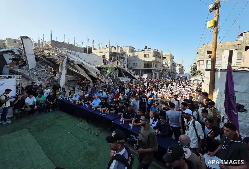 Palestinian children take part in a marathon among the rubble of the al-Amal neighborhood in Khan Younis, southern Gaza Strip, on July 31, 2026. The event coincides with the launch of the neighborhood's first initiative...