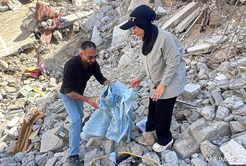 Palestinian bride Aya Matran sits on the rubble of the home where she had planned to live after her wedding in the Maghazi refugee camp, central Gaza Strip, on August 6, 2026. Matran said the house was destroyed in an Is...