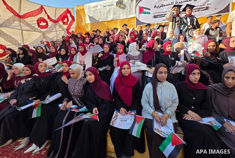 Top-performing Palestinian high school students attend a recognition ceremony organized by community groups in Khan Younis, southern Gaza Strip, alongside their families, on August 6, 2026. The event honored 140 students...