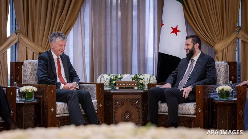 Syrian President Ahmad al-Sharaa meets British National Security Adviser Jonathan Powell, in the presence of Foreign Affairs and Expatriates Minister Asaad al-Shaibani, in Damascus, Syria, on August 8, 2026. Photo by Syr...