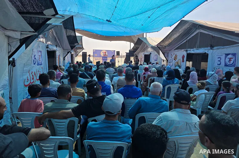 Palestinians attend the opening of the new Shafa Amr School in the al-Mawasi area of Khan Younis, in the southern Gaza Strip, on August 23, 2026. The school aims to restore access to education for students who have been...