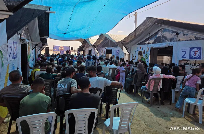 Palestinians attend the opening of the new Shafa Amr School in the al-Mawasi area of Khan Younis, in the southern Gaza Strip, on August 23, 2026. The school aims to restore access to education for students who have been...