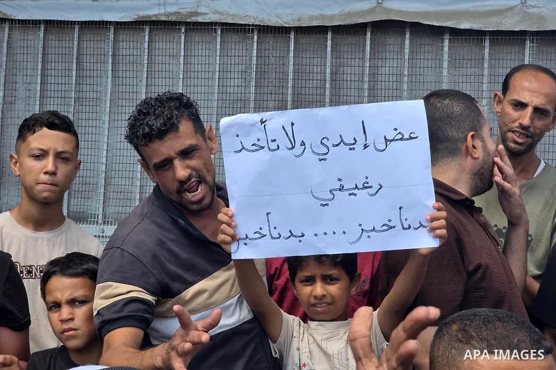 Displaced Palestinians protest against cuts by the World Food Programme to bread rations allocated to residents in Khan Younis, southern Gaza Strip, on September 3, 2026. The protest comes amid a worsening humanitarian c...