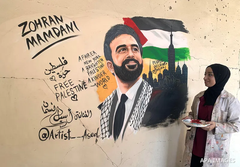 Palestinian artist Aseel Nasman creates artwork on the rubble of destroyed homes in the Gaza Strip on September 24, 2026. Nasman uses her art to portray international figures who have expressed support for Palestinians,...