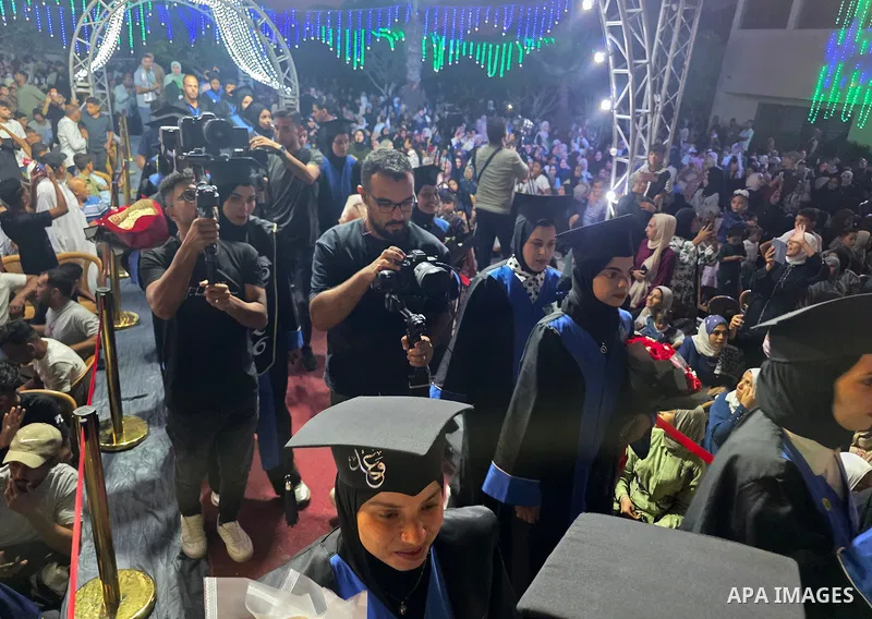 Students attend a graduation ceremony for 180 graduates of the University College of Applied Sciences, as part of the “Phoenix” graduating class, in Khan Younis, southern Gaza Strip, on September 27, 2026. The ceremony c...