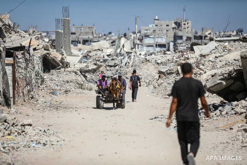 Displaced Palestinians carry out their daily activities inside tents set up near their destroyed homes in the al-Zeitoun neighborhood, south of Gaza City, on September 28, 2026. Palestinian families continue to live in t...
