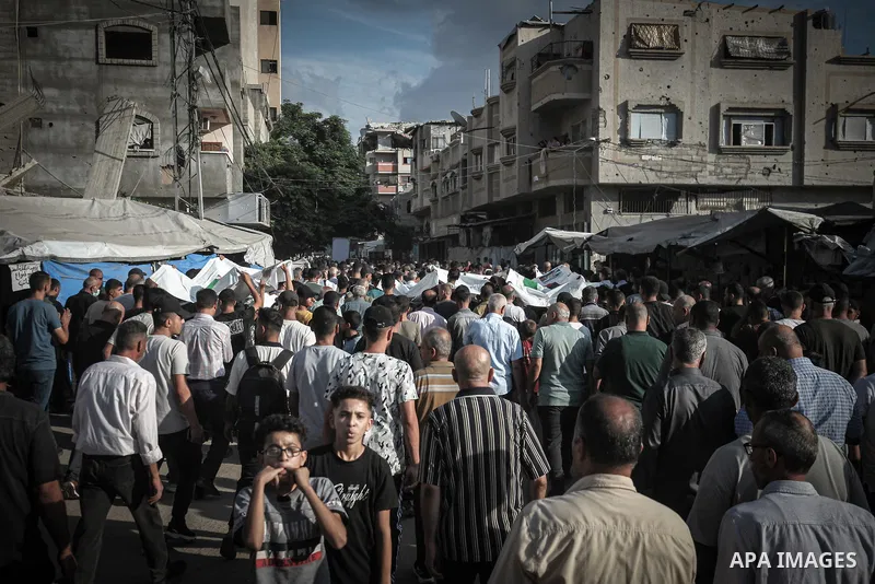 Palestinians attend the funeral of ten members of the al-Thawabta family in al-Bureij refugee camp, central Gaza Strip, on September 29, 2026, after their bodies were recovered from beneath the rubble of the Engineers To...