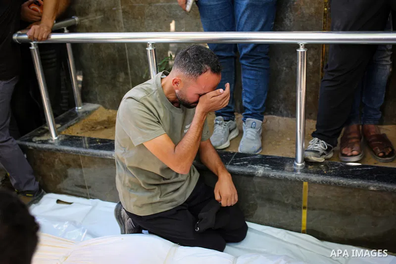 Mourners bid farewell to the bodies of five Palestinians in Gaza City on September 30, 2026, after they were killed in an Israeli strike targeting a vehicle pulling a cart used to transport civilians in the Tel al-Hawa n...