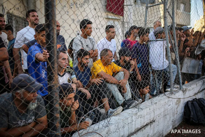 Palestinians play a match between Khadamat Jabalia and Shabab al-Zaytoun during the opening of the “1000 Shaheed” football tournament in the Gaza Strip on October 3, 2026. The tournament is being held in tribute to more...