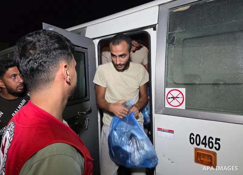 Five released Palestinian prisoners arrive aboard vehicles of the International Committee of the Red Cross (ICRC) at Nasser Medical Complex in Khan Younis, southern Gaza Strip, on October 4, 2026. The prisoners were rele...