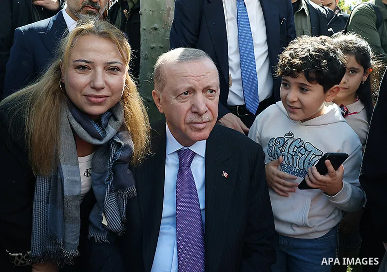 Turkish President Recep Tayyip Erdogan speaks with visitors, participants and children during his visit to the “Family Fest” program at Rami Library in Istanbul, Turkey, on October 5, 2026. The event is part of the “Ten...
