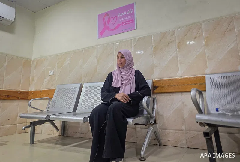 Palestinian women undergo early breast cancer screening at Nasser Medical Complex in Khan Younis, in the southern Gaza Strip, on October 6, 2026, as part of “Pink October” activities to raise awareness of the importance...