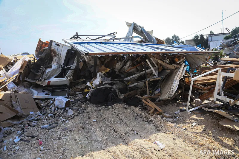 Palestinians inspect the rubble of shops, vehicle repair workshops and a house demolished by Israeli bulldozers in the village of Haris, southwest of Nablus, in the West Bank, on October 14, 2026. Photo by Mohammed Nasse...