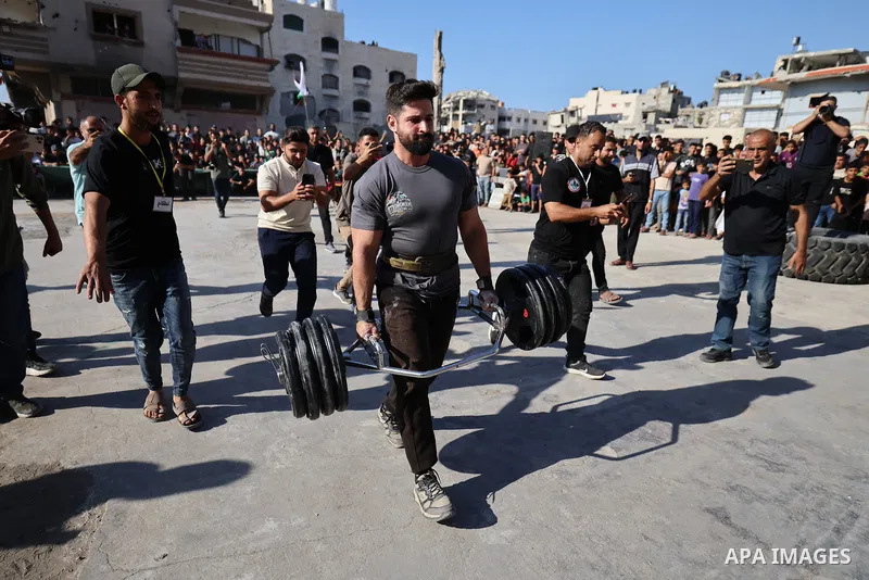 Palestinian athletes compete in the Strongman Palestine 2026 championship, organized for the first time by the Palestinian Physical Strength Federation in Gaza City, on October 16, 2026. The competition aims to promote s...
